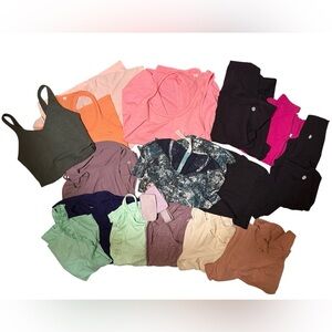 Lululemon Lot shirts,tanks,pants 18 total variety sizes includes bonus wristlet!